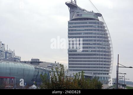 Bremerhaven, Germany - October 21, 2018: Modern new four star Atlantic hotel sail city skyscraper building at waterfront fall day. Stock Photo