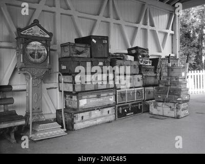 Vintage luggage on the platform of the Bluebell Line Heritage Steam Railway, East Sussex Stock Photo