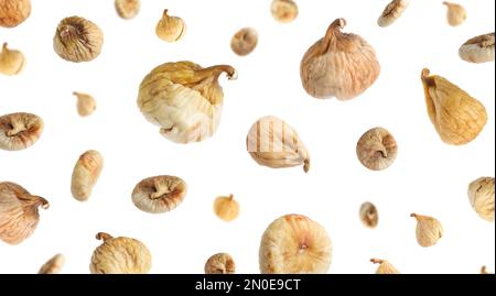 Dried fig fruits falling on white background. Banner design Stock Photo