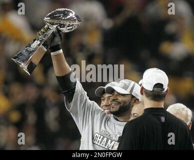 Steelers running back Jerome Bettis holds the Vince Lombardi Trophy up as  the Super Bowl XL champion Pittsburgh Steelers celebrate in a parade down  Fifth avenue in Pittsburgh, Pa., on February 7