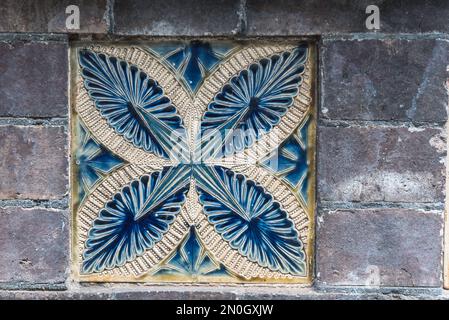 Tile in the wall of Southbank House/ China Works the old Royal Doulton factory in Lambeth Stock Photo