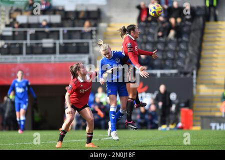 Leigh, UK. 5th February, 2023. Ona Batlle of Manchester United Women  Football Club tussles with Katja Snoeijs of Everton Womens Football Club  during the Barclays FA Women's Super League match between Manchester