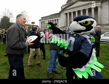 Gov. Inslee played catch with Blitz the Seahawks mascot