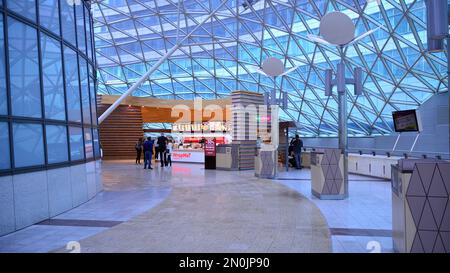 Warsaw, Poland. 27 October 2020. Wide angle view of empty food court at Zlote Tarasy shopping mall. Customers are not allowed to dine-in, Stock Photo