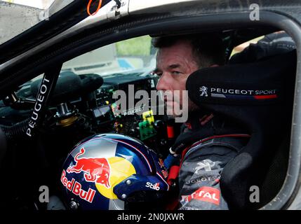 Driver Sebastien Loeb, from France, steers his Citroen DS3 WRC, during the  Portugal FIA World Rally Championship first stage, Friday, March 25, 2011,  near Ourique, southern Portugal. (AP Photo/ Francisco Seco Stock