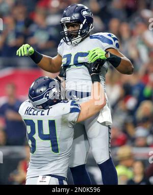 Seattle Seahawks running back Bryce Brown breaks a tackle by Cleveland  Browns defensive back Donte Whitner (31) at CenturyLink Field in Seattle,  Washington on November 29, 2015. The Seahawks clinched their fourth