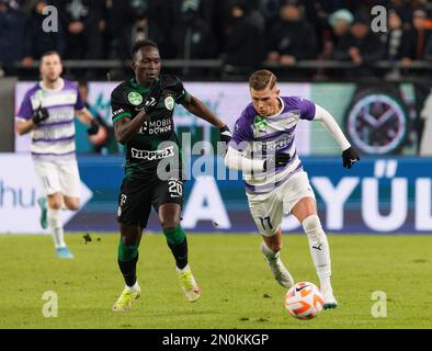Adama Traore of Ferencvarosi TC fights for the possession with Yuri News  Photo - Getty Images