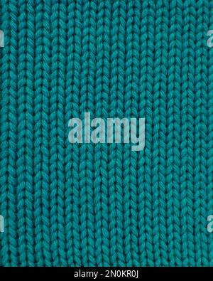 Woolen blue knitted warm texture fabric background Stock Photo