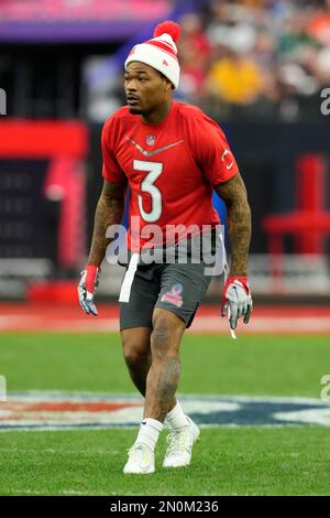 AFC strong safety Derwin James (3) of the Los Angles Chargers celebrates  with AFC cornerback Sauce Gardner (1) of the New York Jets during the flag  football event at the Pro Bowl