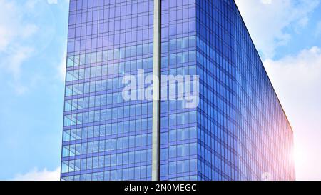 Downtown corporate business district architecture. Glass reflective office buildings against blue sky and sun light. Economy, finances, business Stock Photo