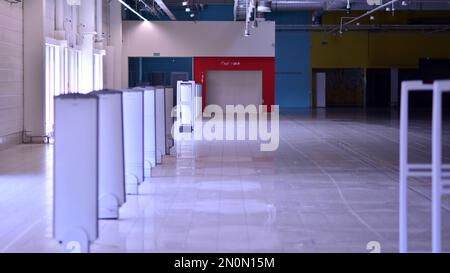Supermarket going out of business. Interior of a closed big supermarket. Stock Photo