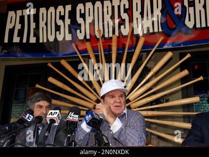 Former Cincinnati Reds manager Pete Rose hits a softball during batting  practice for a celebrity all-star game in Milford, Ohio, Oct. 5, 1989. Rose  was playing for the WLW radio team. Money