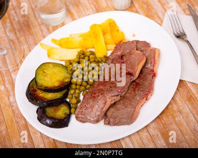 Roasted beef with potatoes Stock Photo
