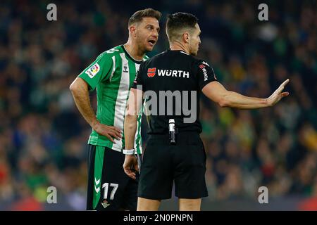 The referee Carlos del Cerro Grande and Joaquin Sanchez of Real Betis  during the La Liga match, Date 20, between Real Betis and RC Celta played at Benito Villamarin Stadium on February 04, 2023 in Sevilla, Spain. (Photo by Antonio Pozo / PRESSIN) Stock Photo