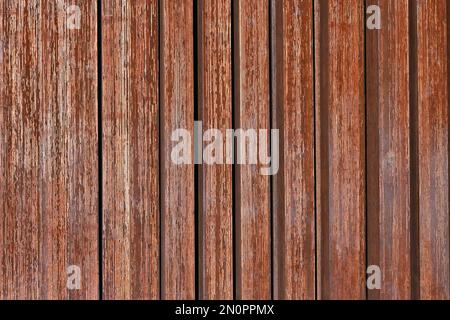 Weathered metal surface showing rust and aging texture in vertical stripes Stock Photo