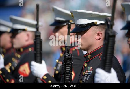 U.S. Marines stand at parade rest during the Jacksonville Jaguars