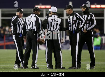 Replay Assistant Roddy Ames, from left, line judge Bart Longson (2), Down  Judge David Oliver, field judge Terry Brown (43), umpire Carl Paganelli  (124), referee Walt Anderson (66), referee Carl Cheffers (51)