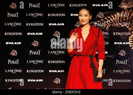 Chinese Actress Nicole Liang Poses On The Red Carpet At The 52nd Golden 