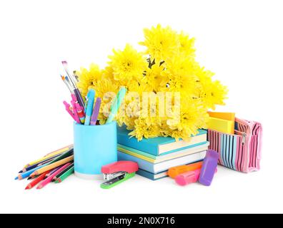 Beautiful flowers and stationery on white background. Teacher's Day Stock Photo