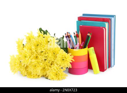 Beautiful flowers and stationery on white background. Teacher's Day Stock Photo