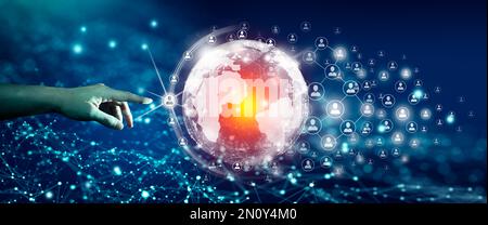 Businessman Leading the global world business community of network communication connected. Digital and technological convergence with abstract blue. Stock Photo