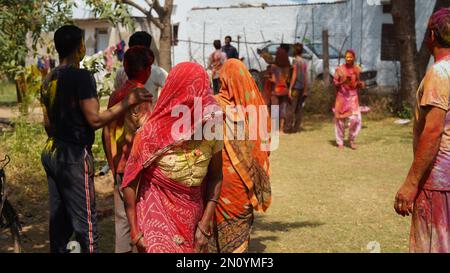 05 February 2023 Jaipur, Rajasthan, India. People throw colors to each other during the Holi celebration Stock Photo