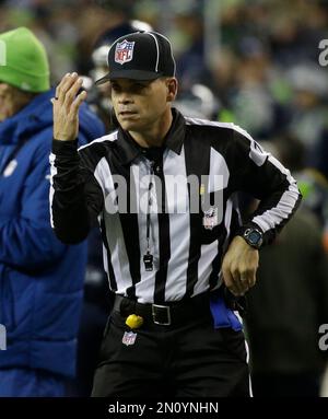 Back Judge Steve Patrick wears a Crucial Catch hat during an NFL football  game between the Carolina Panthers and Dallas Cowboys, Sunday, Oct. 3, 2021,  in Arlington, Texas. Dallas won 36-28. (AP