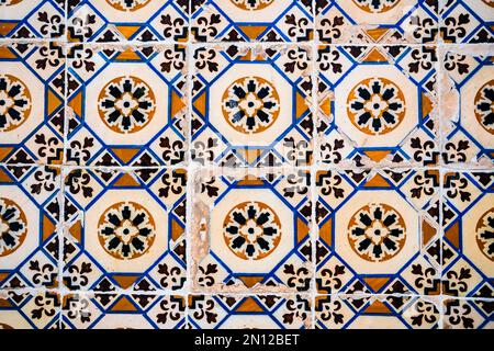 Old Portuguese tiles called azulejo found on the wall in Sesimbra, Portugal, Europe Stock Photo