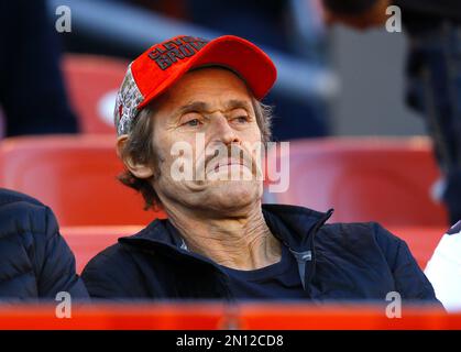 Cleveland Browns fan Actor Willem Dafoe watches his team play the