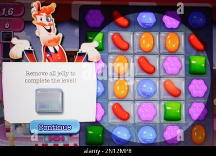 A detail from the online game Candy Crush Saga is shown on a