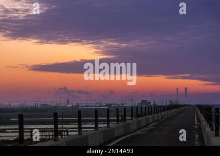 Colorful sunsets on the coast, petrochemical plants on outlying islands. Sixth naphtha cracker, Mailiao Township, Yunlin County, Taiwan Stock Photo