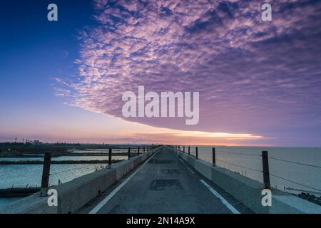 Colorful sunsets on the coast, petrochemical plants on outlying islands. Sixth naphtha cracker, Mailiao Township, Yunlin County, Taiwan Stock Photo