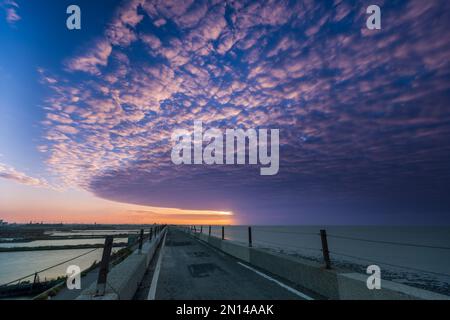 Colorful sunsets on the coast, petrochemical plants on outlying islands. Sixth naphtha cracker, Mailiao Township, Yunlin County, Taiwan Stock Photo