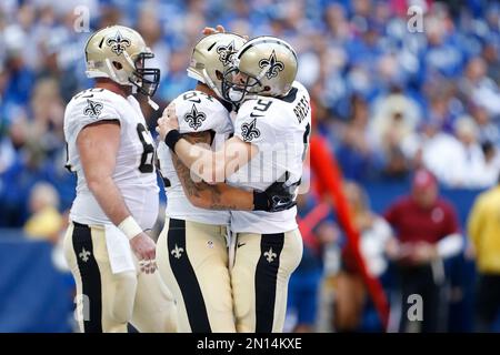 New Orleans Saints tight end Adam Trautman (82) runs the ball up the field  during an NFL football game against the Minnesota Vikings at Tottenham  Hotspur Stadium, Sunday, Oct. 2, 2022, in