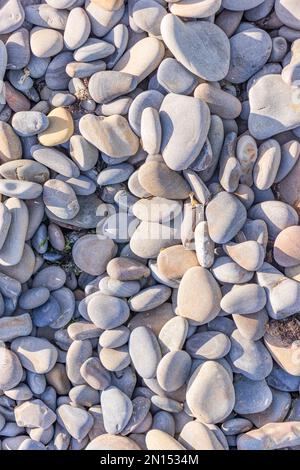 Abstract nature pebbles background. Blue pebbles texture. Stone background. Blue vintage color. Sea pebble beach. Beautiful nature. Turquoise color Stock Photo