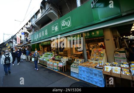 Ameya-Yokocho is a lively street market that runs alongside the railway tracks between JR Ueno Station and Okachimachi Station.,Tokyo, Japan. Stock Photo