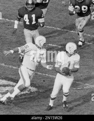 FILE - Washington Redskins' Mike Bass (41) gets the ball which deflected  out of Miami Dolphins kicker Garo Yepremian's (1) hands during NFL  football's Super Bowl VII in Los Angeles, Jan. 14,