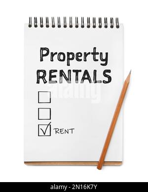 Notebook with text Property Rentals, check mark and boxes on white background Stock Photo