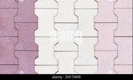 interlocking block paving floor background beige white pink red burgundy demo example Stock Photo