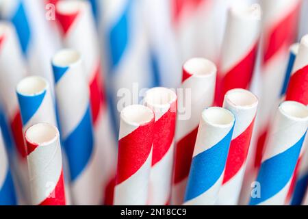 Multi-colored paper straws for drinks close-up, macro shot. Stock Photo