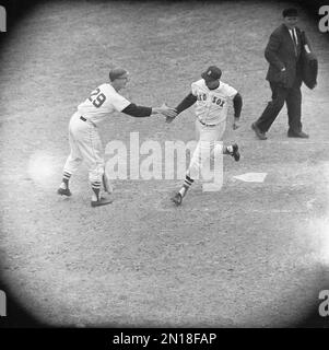 Ted Williams of the Red Sox hits his 362nd home run to put him in