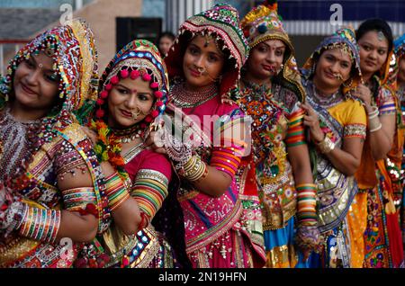 Indian girls practice the Garba dance steps in preparation for the ...