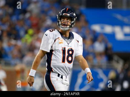 Denver Broncos quarterback Peyton Manning (18) watches a replay against the  Detroit Lions during the first half of an NFL football game, Sunday, Sept.  27, 2015, in Detroit. (AP Photo/Paul Sancya Stock