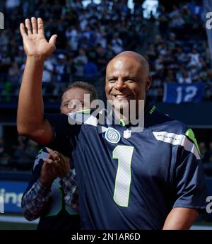 Former Seattle Seahawks quarterback Warren Moon is recognized during a  halftime celebration of the 40th anniversary of the Seattle Seahawks  Chicago Bears during an NFL football game against the Chicago Bears,  Sunday, Sept. 27, 2015, in Seattle. (AP