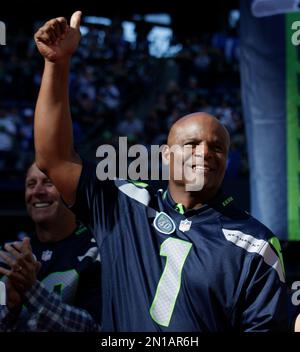 Former Seattle Seahawks quarterback Warren Moon is recognized during a  halftime celebration of the 40th anniversary of the Seattle Seahawks  Chicago Bears during an NFL football game against the Chicago Bears, Sunday