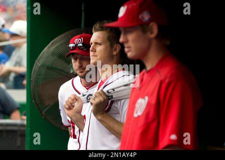 From left, Philadelphia Phillies pitchers Roy Oswalt, Joe Blanton and Roy  Halladay enter the ballpark in their green St. Patrick's Day jersey prior  to action against the Toronto Blue Jays at Bright