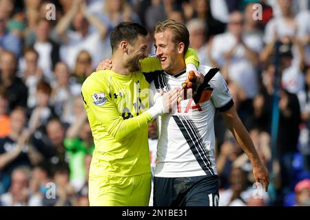 Tottenham Hotspur's goalkeeper captain Hugo Lloris, left, and Harry Kane celebrate together after the final whistle in their 4-1 win over Manchester City in the English Premier League soccer match between Tottenham Hotspur and Manchester City at White Hart Lane stadium in London, Saturday, Sept. 26, 2015. (AP Photo/Matt Dunham)