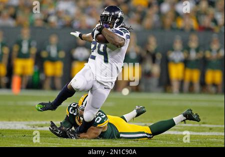 Seattle Seahawks' Marshawn Lynch runs during the first half of an NFL  football game against the Green Bay Packers Sunday, Sept. 20, 2015, in Green  Bay, Wis. (AP Photo/Jeffrey Phelps Stock Photo 