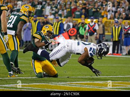 Seattle Seahawks' Doug Baldwin (89) celebrates his touchdown catch with  Fred Jackson during the second half of an NFL football game against the  Green Bay Packers Sunday, Sept. 20, 2015, in Green