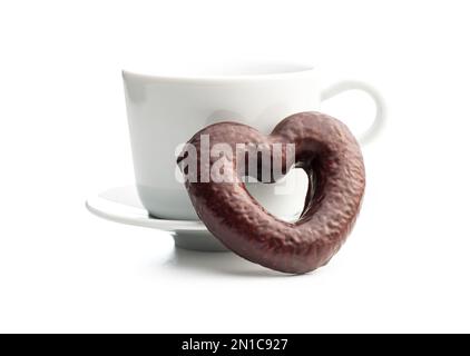 Sweet chocolate heart and coffee cup isolated on the white background. Stock Photo